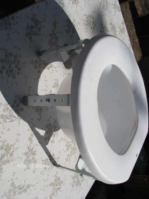A TOILET SEAT RAISER.......... BOUGHT BUT NEVER USED.... IN AS NEW CONDITION