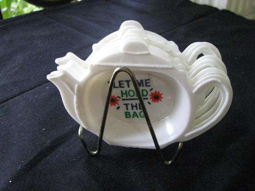A LOVELY SET OF 6 TEABAG HOLDERS WITH STAND IN ORIGINAL PACKAGING..PURE 1970'S RETRO@CRAAZY R1 START