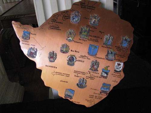 NOSTALGIC COLLECTORS ITEM...COPPER MAP OF RHODESIA WITH BADGES & OLD PLACE NAMES @CRRAAZY R1 START