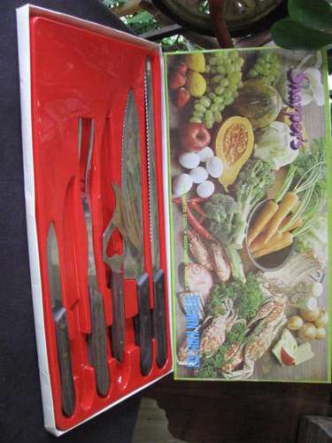 A KITCHEN KNIVES SET WITH ROSEWOOD HANDLES...GOOD QUALITY IN ORIGINAL PACKAGING @ CRRAAAZZY R1 START