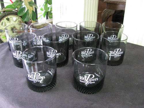 A SET OF 11 GLASSES ...... 100 PIPERS SCOTCH WHISKY GLASSES ..BID EACH@@@ CRAZY LOW START