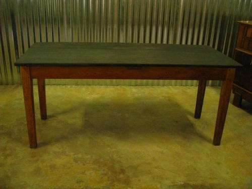 A VINTAGE (POSSIBLY 1910 OR SO) OREGON TABLE WITH CHAMFERED LEGS