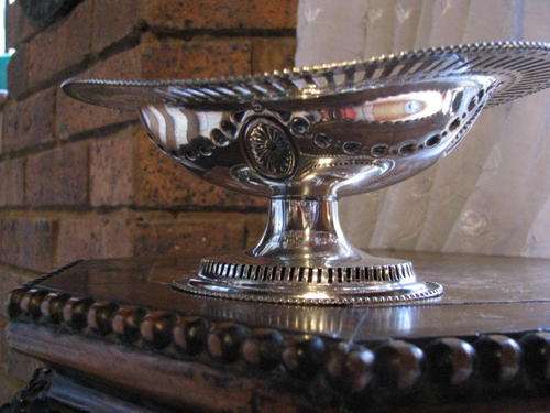 A PIERCED BON BON DISH ON CENTRAL COLIMN WITH IMPRESSED PATTERN...LOVELY VINTAGE ITEM