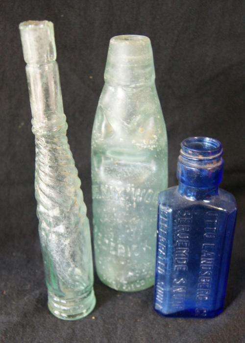 Antique bottles..... 3 assorted bottles...the blue one a bereomide snuff bottle..bid/bottle