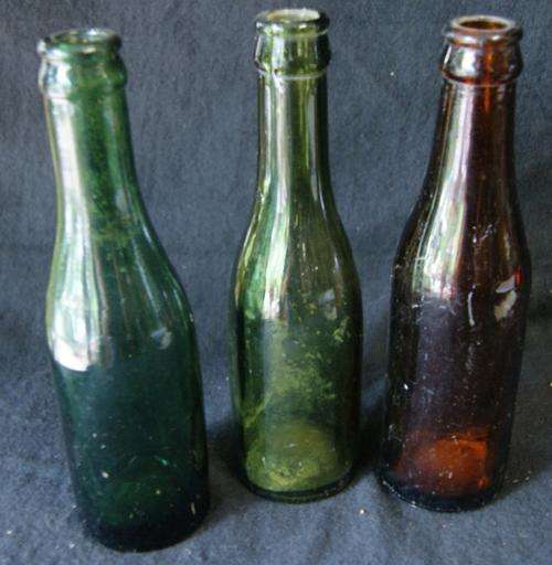 Assorted VINTAGE Green and Brown Glass Drink Bottles....wonderful collectable items..bid/bottle