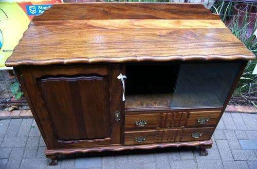 Vintage Teak Linen Fold Ball and Claw Display Cabinet