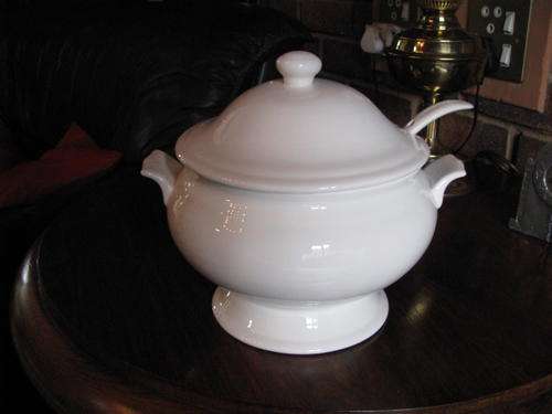 A GORGEOUS WHITE CERAMIC SOUP OR STEW TUREEN WITH LID AND LADLE..