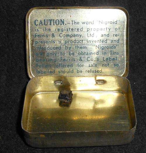 Antique Nigroids Licorice Candy Tin