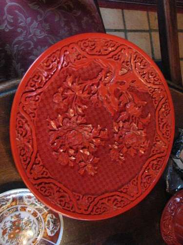 VINTAGE SOLID CINNABAR RED CARVED DISPLAY PLATE.......HIGHLY DETAILED AND VERY BEAUTIFUL