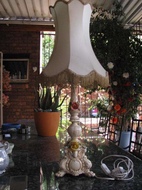 GORGEOUS VINTAGE CERAMIC/PORCELAIN LAMP WITH ORIGINAL LAMPSHADE...FLORAL AND FACE DETAIL