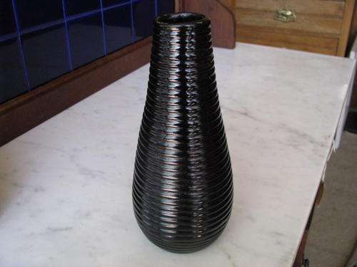 *** LOVELY OLD GLASS VASE.... BURGUNDY IN THE SUNLIGHT.***