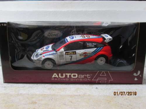 REDUCED TO CLEAR - 1:18 SCALE AUTOART FORD FOCUS WRC (McRAE 1999 SAFARI RALLY) BOXED - LOT 595W
