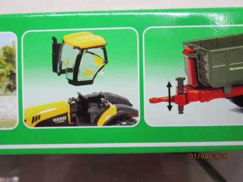 HO SCALE : SIKU JCV TRACTOR WITH FARM TRAILER (BOXED) - LOT 974z