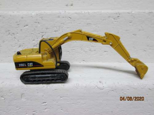 HO SCALE - NORSCOT - CAT 315C L HYDRAULIC EXCAVATOR - BOXED - LOT 45 BB