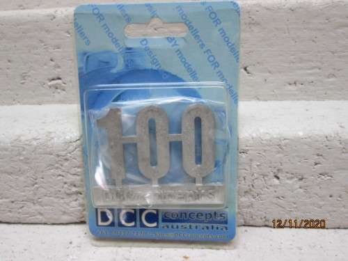 REDUCED TO CLEAR : DCC CONCEPTS : `100` WHITE METAL BADGE