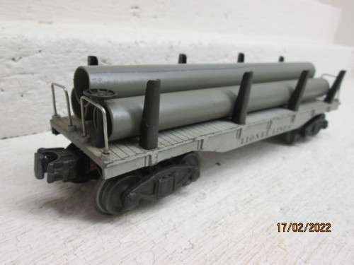 O SCALE : LIONEL : FLAT CAR WITH PIPE LOAD