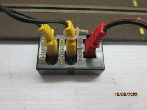 1: 32 SCALE : SCX/TYCO TRACK TRANSFORMER AND CONTROLLERS