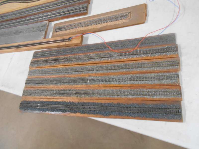 VARIOUS DISPLAY TRACKS - MOUNTED ON VARIOUS WOODEN ITEMS - X15 PIECES