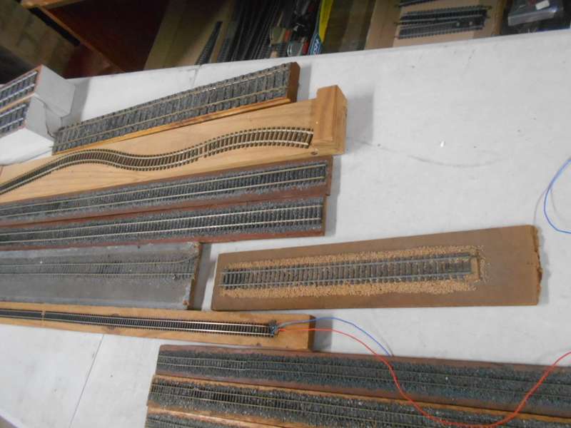 VARIOUS DISPLAY TRACKS - MOUNTED ON VARIOUS WOODEN ITEMS - X15 PIECES