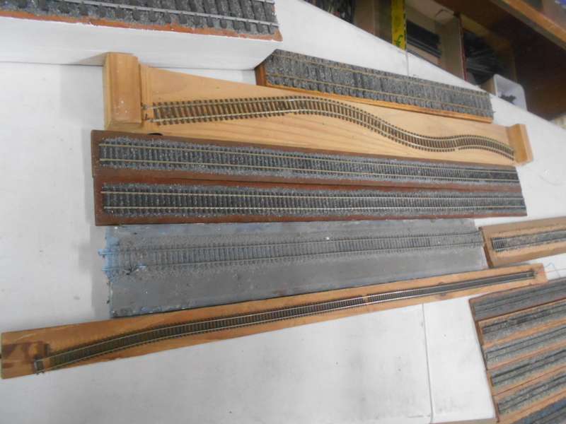 VARIOUS DISPLAY TRACKS - MOUNTED ON VARIOUS WOODEN ITEMS - X15 PIECES