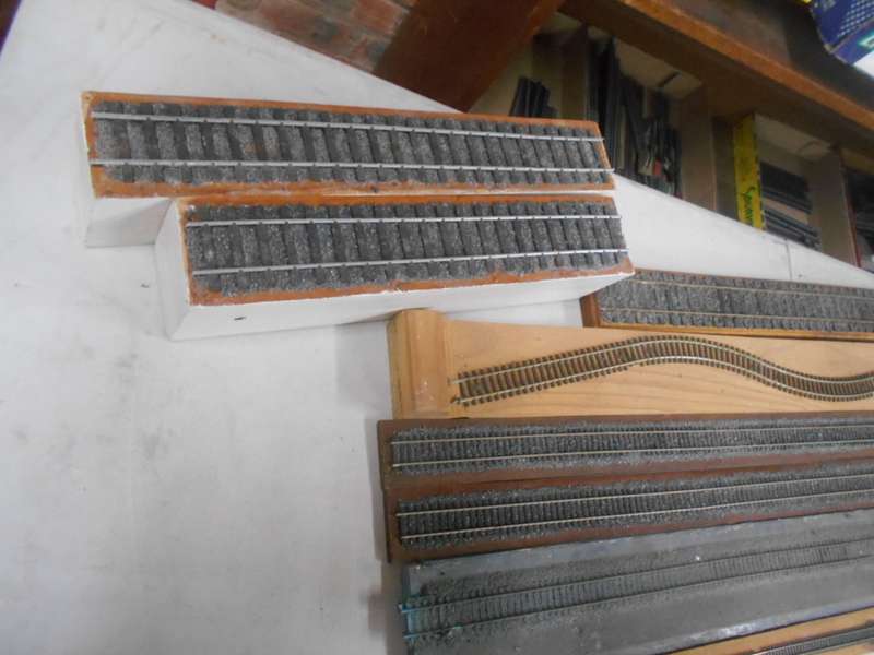 VARIOUS DISPLAY TRACKS - MOUNTED ON VARIOUS WOODEN ITEMS - X15 PIECES