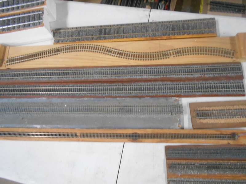 VARIOUS DISPLAY TRACKS - MOUNTED ON VARIOUS WOODEN ITEMS - X15 PIECES