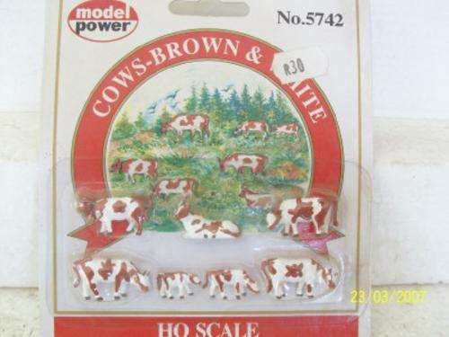 MODEL POWER HO COWS BROWN AND WHITE
