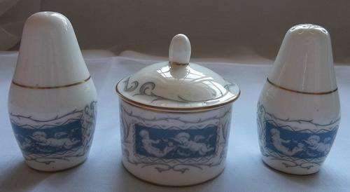 A COALPORT "REVELRY" 3 PIECE CRUET SET.