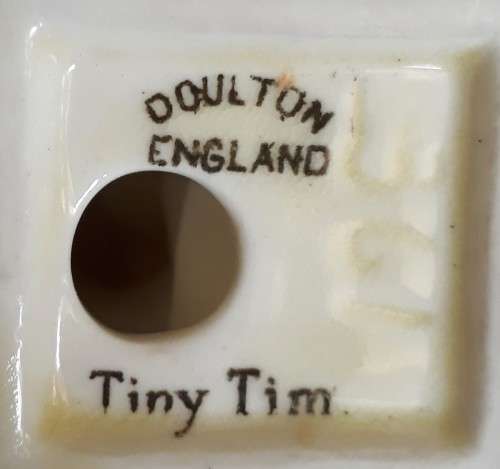 A DOULTON TINY TIM FIGURINE