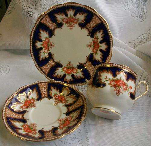 ROYAL ALBERT ROYALTY TEA TRIO. WOW.
