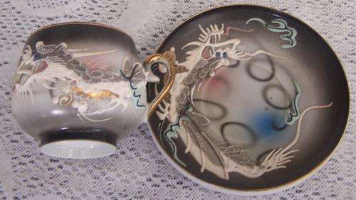 JAPANESE COFFEE DUO WITH DRAGON MOTIF.