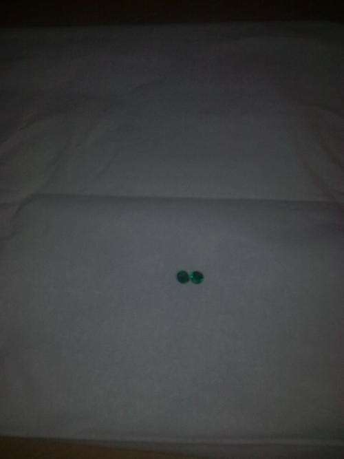 2 x 5.8mm round emeralds