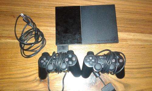 Playstation 2 with remotes & 12 games