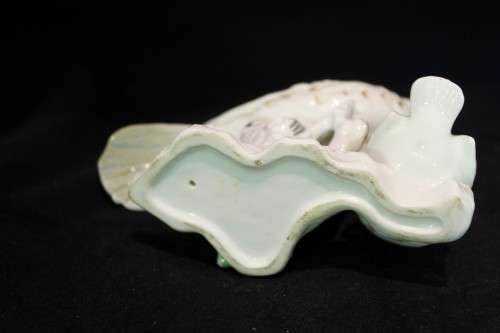 Porcelain bird with chick