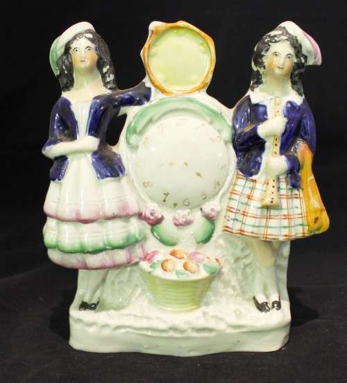 Pair of ladies and a clock