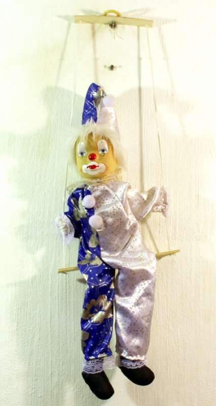 Clown on a swing - Silver and blue costume