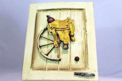 Small storage cabinet - saddle embellishment