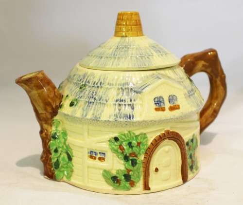 Ornate ceramic tea pot in the form of a house - Beautiful!