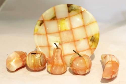 Marble fruit on a marble pedestal bowl