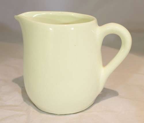 Four white jugs