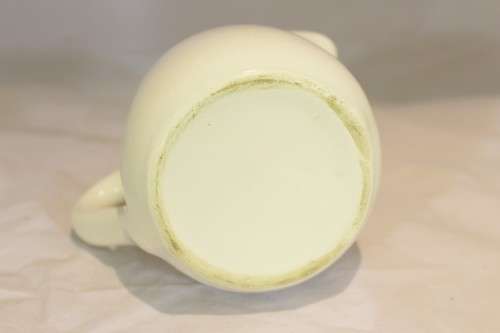 Four white jugs