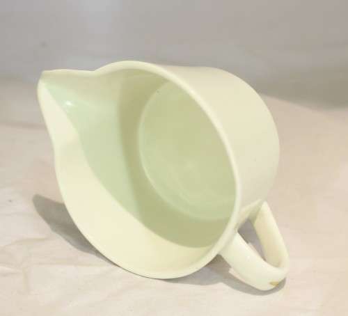 Four white jugs
