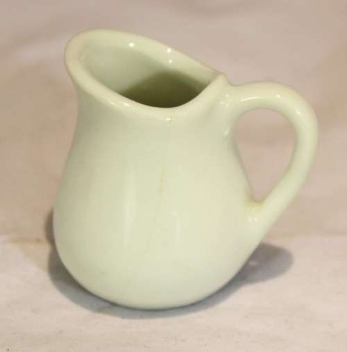Four white jugs
