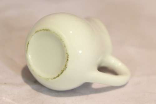 Four white jugs