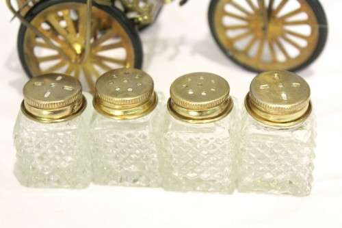 Salt & Pepper sets on a delivery bike - A stunner! - A beauty at a low price, bid now