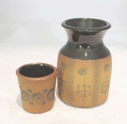 small pottery and glass vessel