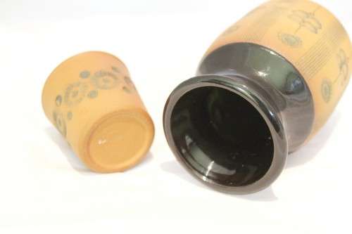 small pottery and glass vessel
