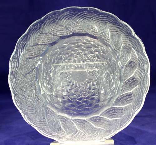 Glass side plate with woven pattern