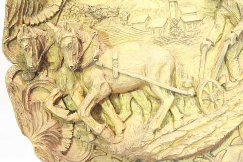 Carved wall hanging - European scene - ploughing