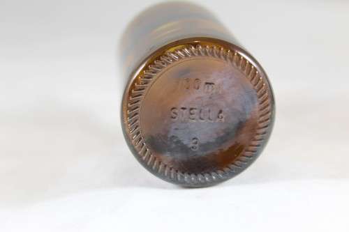 Stella - brown medicine bottle - marked number twelfth